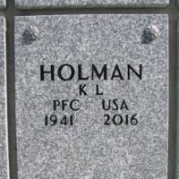 K.L. HOLMAN